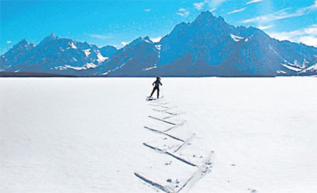 Thị trấn Jackson, Wyoming Trượt tuyết trên mặt hồ Jackson hướng tới núi Moran cao 3.842m