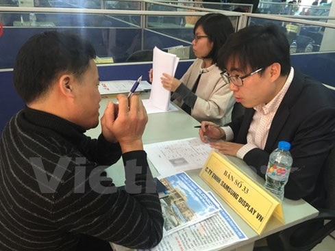 Phỏng vấn các ứng viên xin việc. (Ảnh: Hồng Kiều/Vietnam+)