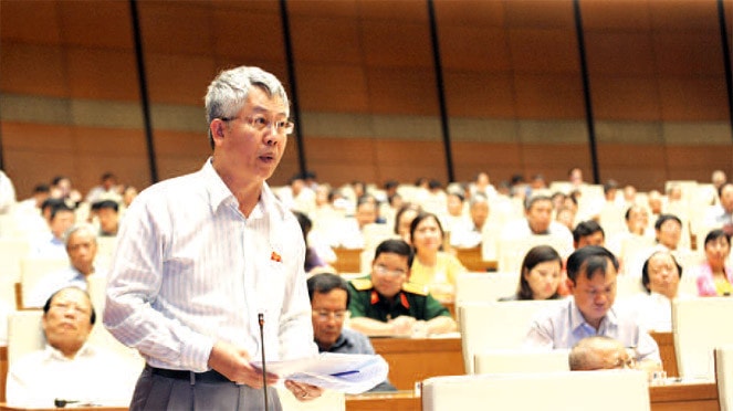 Phó Chủ nhiệm Ủy ban Kinh tế Nguyễn Đức Kiên phát biểu tại Hội trường Ảnh: Lâm Hiển