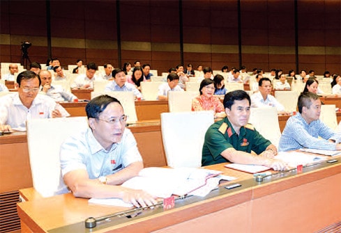 ĐBQH biểu quyết thông qua Luật Trợ giúp pháp lý Ảnh: Đình Nam