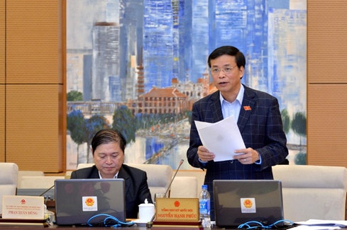 Tổng Thư ký Quốc hội, Chủ nhiệm Văn phòng Quốc hội Nguyễn Hạnh Phúc trình bày Báo cáo Tổng kết Kỳ họp thứ Sáu, Quốc hội Khóa XIV Ảnh: Quang Khánh