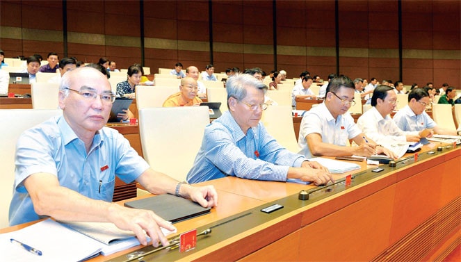 Đoàn đại biểu Quốc hội TP Hồ Chí Minh biểu quyết thông qua Luật Kiến trúc Ảnh: Quang Khánh