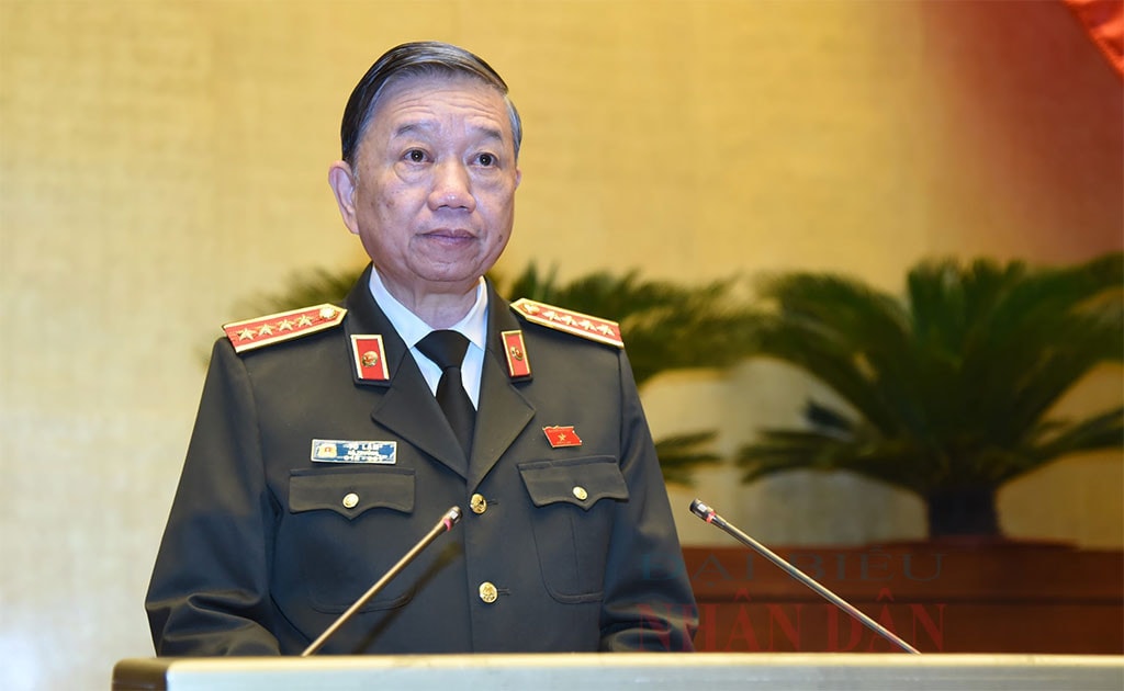 Bộ trưởng Bộ Công an Tô Lâm trình bày Báo cáo công tác phòng, chống tội phạm và vi phạm pháp luật năm 2021 Ảnh: Quang Khánh