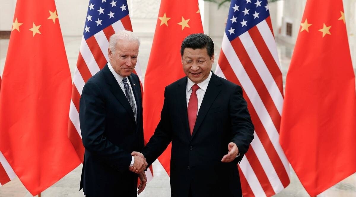 Chủ tịch Trung Quốc Tập Cận Bình, bên phải, bắt tay Tổng thống Mỹ Joe Biden Nguồn: Indian Express