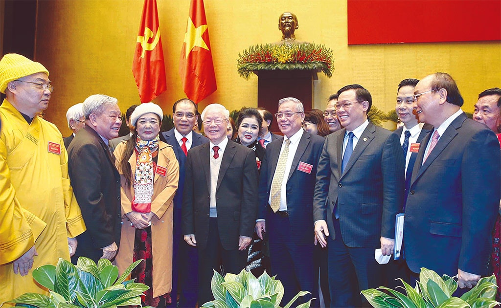 Tổng Bí thư Nguyễn Phú Trọng, nguyên Tổng Bí thư Nông Đức Mạnh, Chủ tịch Nước Nguyễn Xuân Phúc, Chủ tịch Quốc hội Vương Đình Huệ với các đại biểu dự Hội nghị Văn hóa toàn quốc triển khai thực hiện Nghị quyết Đại hội đại biểu toàn quốc lần thứ XIII của Đảng ngày 24.11.2021 Ảnh: Trí Dũng