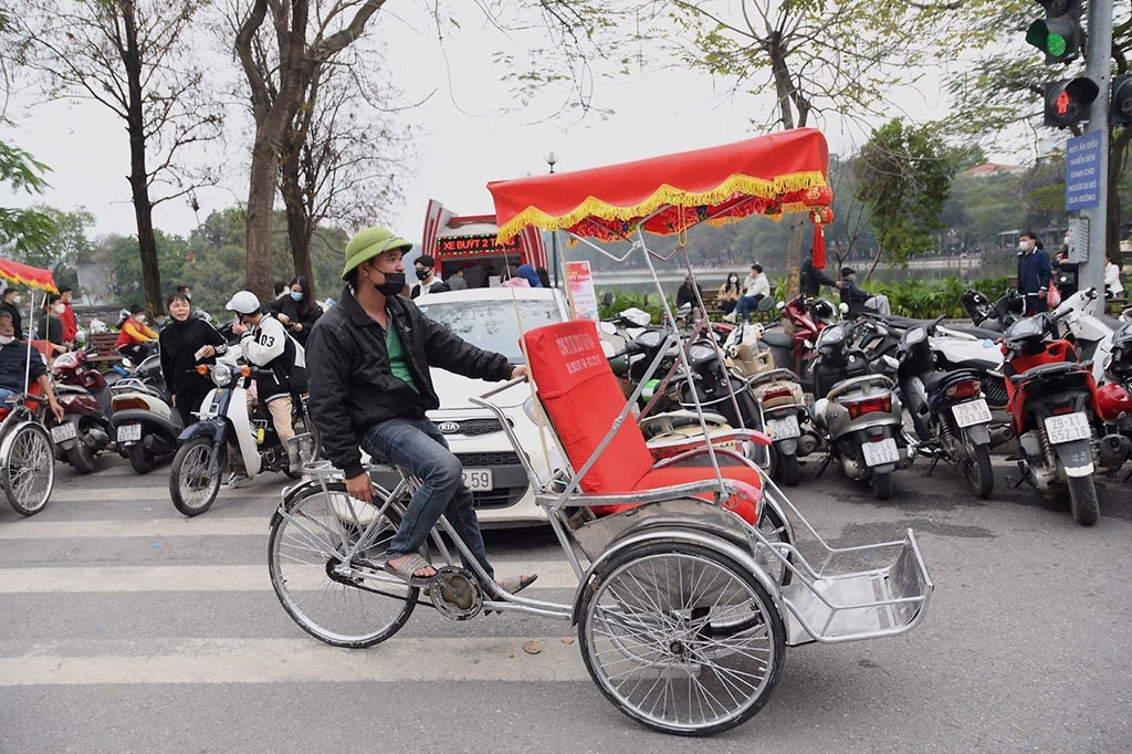 Anh Vũ Văn Chu (43 tuổi) đã gắn liền với nghề lái xích lô đến nay là tròn năm thứ 7