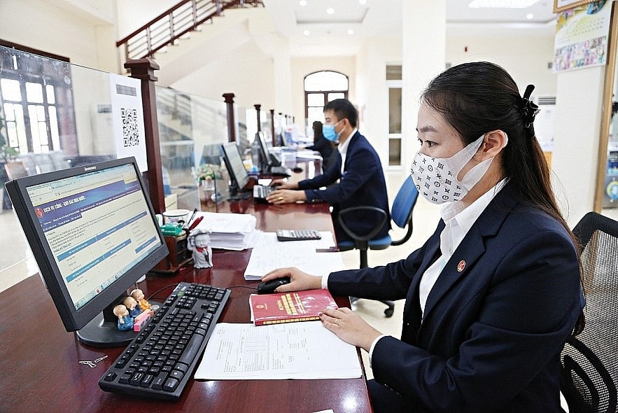 99,4% khách hàng hài lòng với sự phục vụ của các đơn vị trong hệ thống kho bạc Ảnh: T.Linh