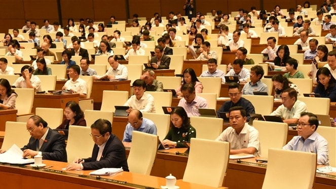 Các đại biểu Quốc hội tại Kỳ họp thứ Ba, Quốc hội Khóa XV. Ảnh: Quang Khánh Bài 2: Chậm tiến độ, chưa yên tâm chất lượng
