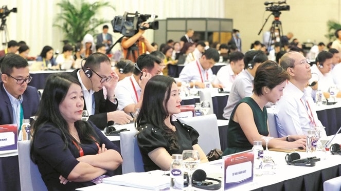 Các đại biểu tham dự Diễn đàn Kinh tế - Xã hội Việt Nam 2022 Ảnh: Hồ Long