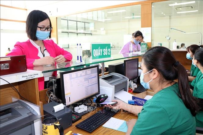 BHXH Việt Nam luôn coi trọng ứng dụng công nghệ thông tin để hỗ trợ người dân và doanh nghiệp ảnh BH