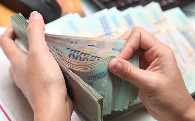 Bảo lưu tiền lương, phụ cấp chức vụ lãnh đạo khi sáp nhập huyện xã -0