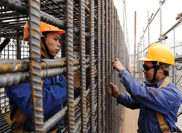 Đề xuất thêm chính sách chia sẻ gánh nặng cho người lao động -0