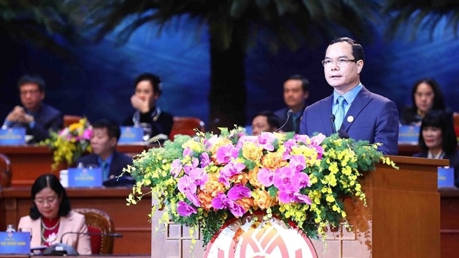 Ủy viên Trung ương Đảng, Bí thư Đảng Đoàn, Chủ tịch Tổng Liên đoàn Lao động Việt Nam Nguyễn Đình Khang báo cáo tại Đại hội - ẢNH NGUYỄN HẢI
