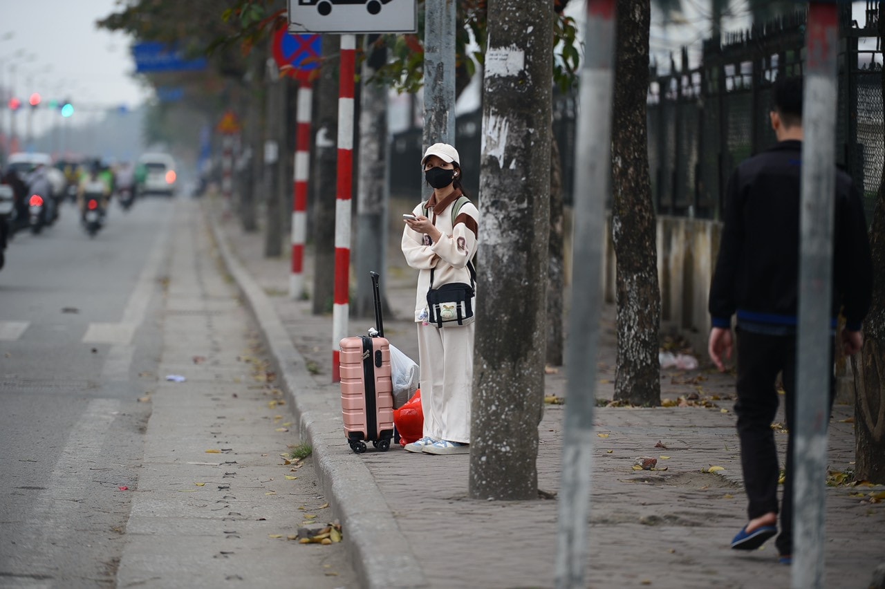Hà Nội: Người dân hối hả về quê ăn Tết Nguyên đán -0