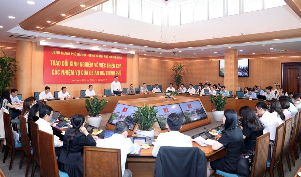 Toàn cảnh buổi trao đổi kinh nghiệm về việc triển khai các nhiệm vụ của Đề án 06 của TP.Hà Nội và TP.Hồ Chí Minh. Ảnh: ITN