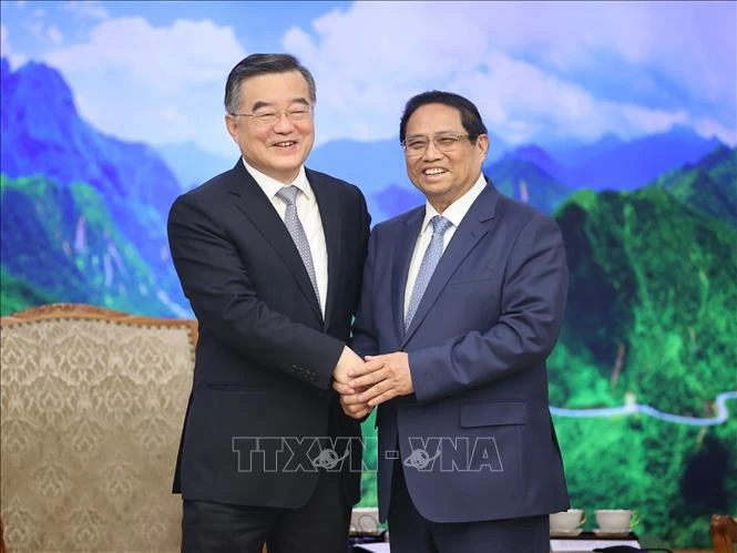 PM Pham Minh Chinh received Zhang Qingwei, Vice Chairman of Chinese NPC. Photo: VNA PM receives Vice Chairman of NPC Standing Committee -0