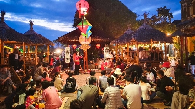 Người dân là một phần của Đô thị cổ Hội An - Ảnh: Lưu Hương