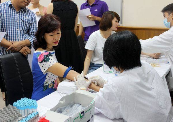 Đẩy mạnh vận động người dân tham gia bảo hiểm y tế hộ gia đình -0