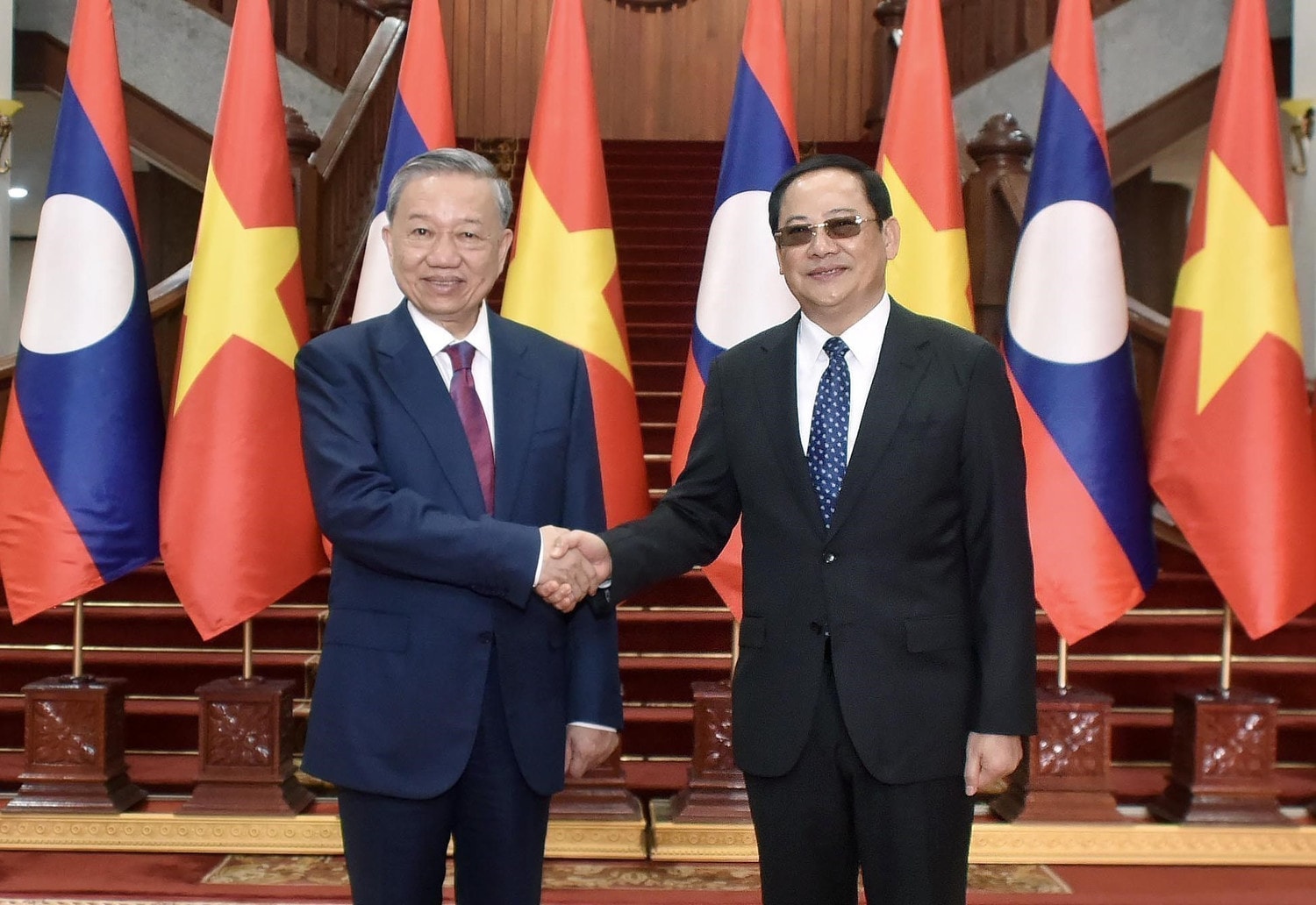 President To Lam had a meeting with Lao Prime Minister Sonexay Siphandone. Photo: VNA/Nguyen Quang Hai President To Lam meets Lao Prime Minister -0