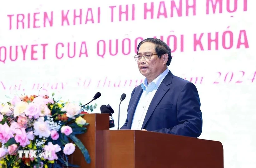 Prime Minister Pham Minh Chinh speaks at the conference. Photo: VNA PM highlights enhancements in law, resolution implementation -0