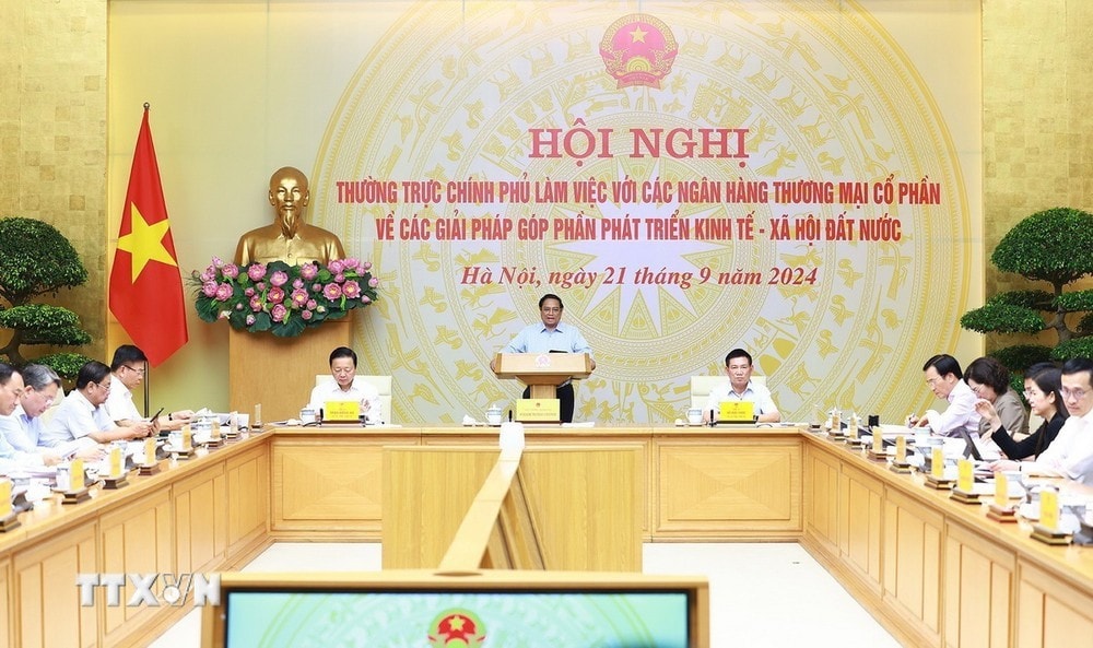 Thủ tướng Phạm Minh Chính chủ trì Hội nghị Thường trực Chính phủ làm việc với các ngân hàng thương mại cổ phần về các giải pháp góp phần phát triển kinh tế - xã hội. Ảnh: Dương Giang/TTXVN