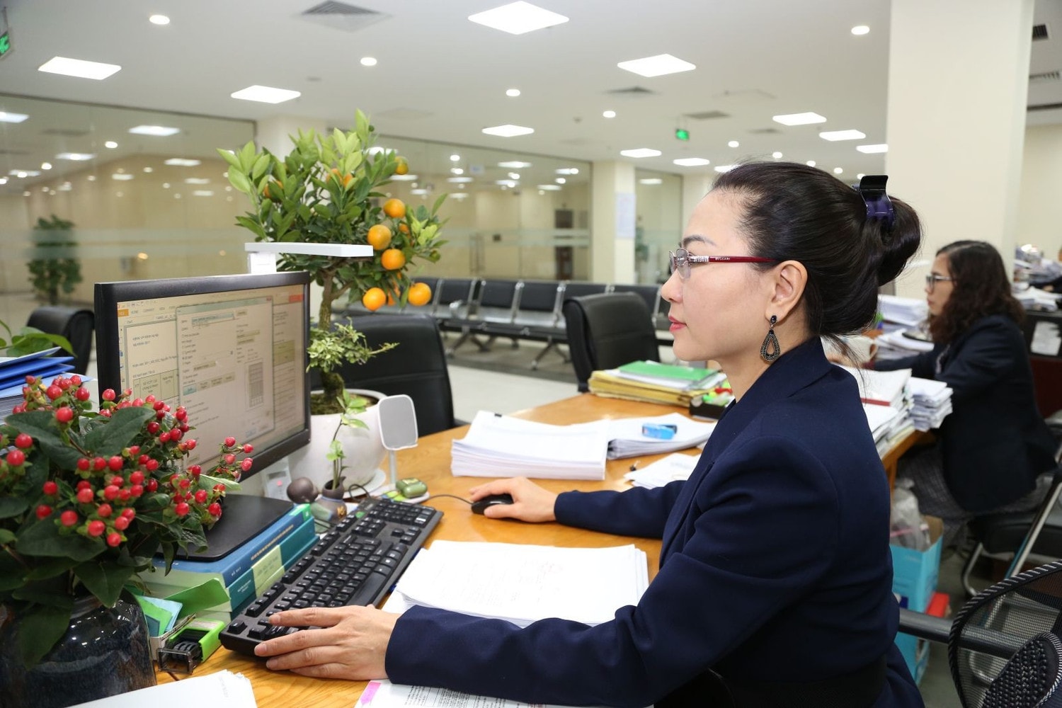 99,91% khách hàng hài lòng với sự phục vụ của Kho bạc Nhà nước. Ảnh: Quang Minh
