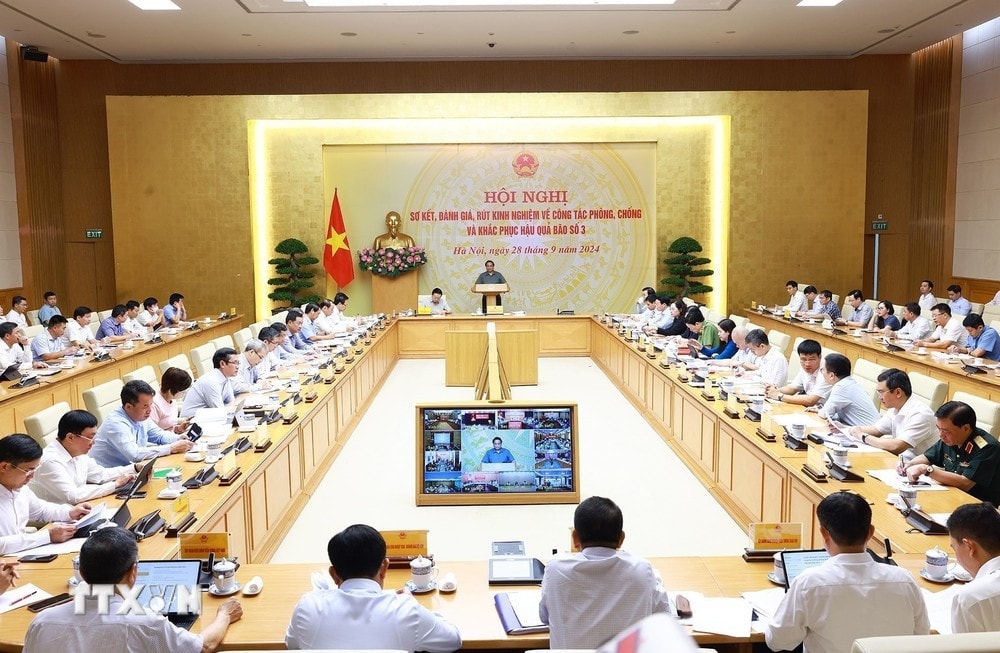 Thủ tướng Phạm Minh Chính chủ trì Hội nghị sơ kết công tác phòng, chống và khắc phục hậu quả bão số 3. Ảnh: Dương Giang/TTXVN