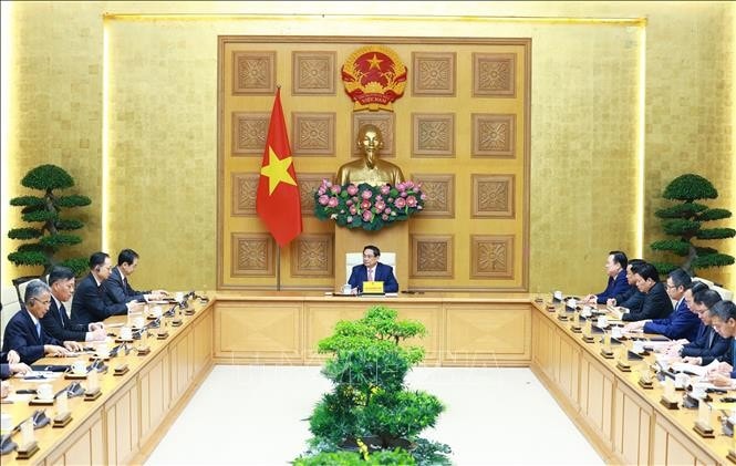Thủ tướng Phạm Minh Chính tiếp Đại sứ Trung Quốc tại Việt Nam Hà Vĩ. Ảnh: Dương Giang/TTXVN