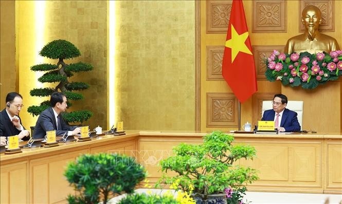 Thủ tướng Phạm Minh Chính tiếp Đại sứ Trung Quốc tại Việt Nam Hà Vĩ. Ảnh: Dương Giang/TTXVN