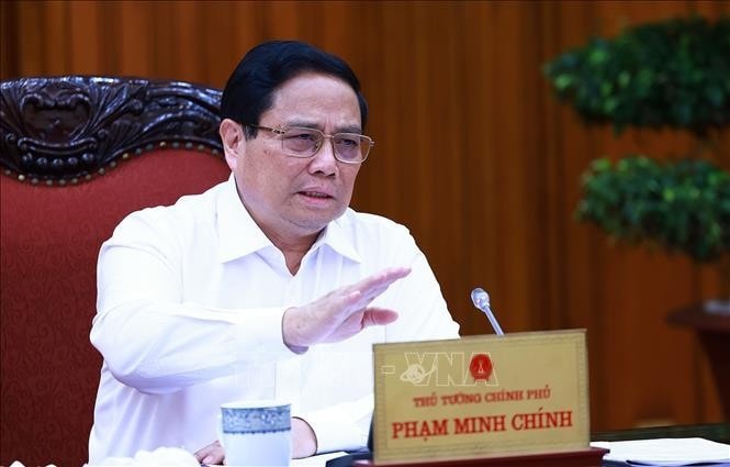 Thủ tướng Phạm Minh Chính chủ trì buổi làm việc. Ảnh: Dương Giang/TTXVN