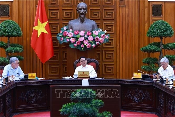 Thủ tướng Phạm Minh Chính chủ trì buổi làm việc. Ảnh: Dương Giang/TTXVN