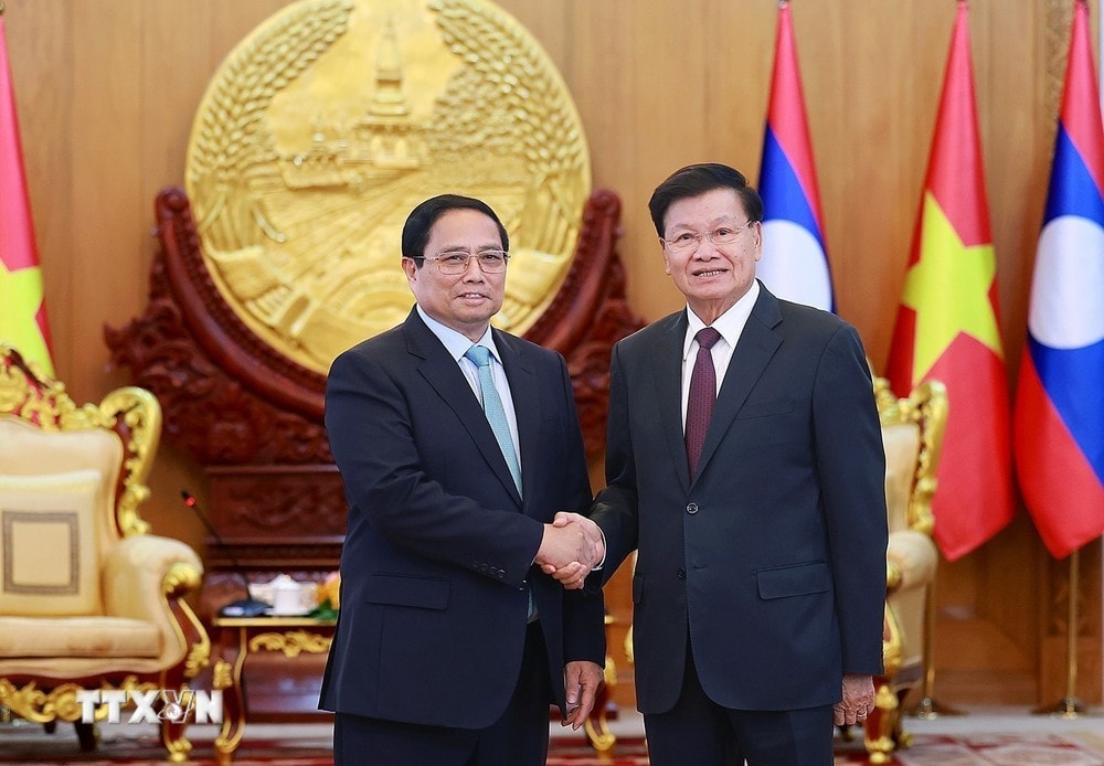 Thủ tướng Phạm Minh Chính hội kiến Tổng Bí thư, Chủ tịch nước Lào Thongloun Sisoulith. Ảnh: Dương Giang/TTXVN
