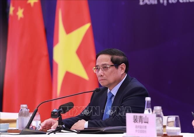 Thủ tướng Phạm Minh Chính phát biểu tại Toạ đàm doanh nghiệp Việt Nam - Trung Quốc. Ảnh: Dương Giang/TTXVN