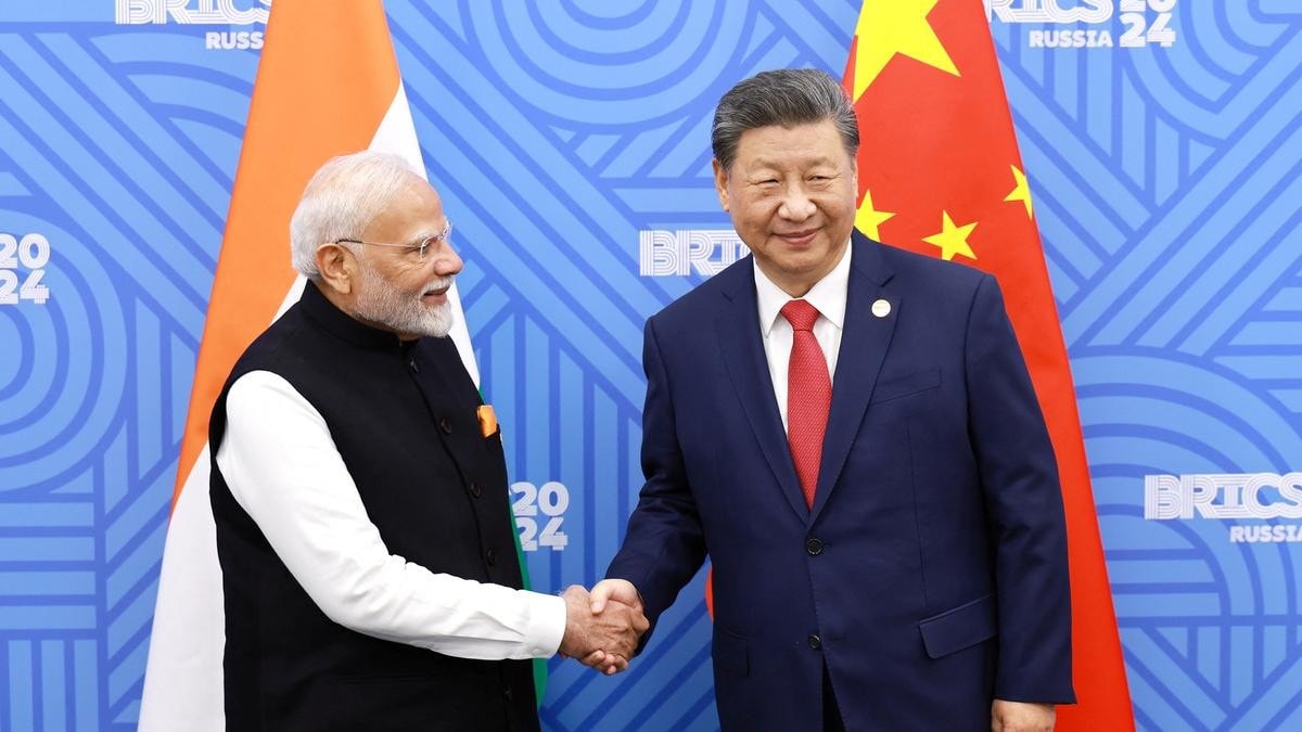 Chủ tịch Trung Quốc Tập Cận Bình gặp Thủ tướng Ấn Độ Narendra Modi bên lề Hội nghị thượng đỉnh BRICS lần thứ 16 vào ngày 23.10.2024. Ảnh: China Daily