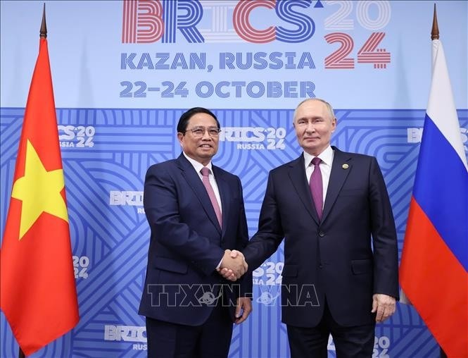 Thủ tướng Phạm Minh Chính với Tổng thống Liên bang Nga Vladimir Putin, Chủ tịch Nhóm BRICS năm 2024. Ảnh: Dương Giang/TTXVN
