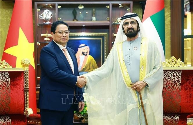 Thủ tướng Phạm Minh Chính và Phó Tổng thống, Thủ tướng UAE Sheikh Mohammed bin Rashid Al. Ảnh: Dương Giang/TTXVN
