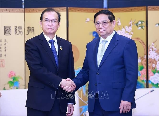 Thủ tướng Phạm Minh Chính tiếp ông Jiang Yi, Chủ tịch Tập đoàn Huadian, Trung Quốc. Ảnh: Dương Giang/TTXVN