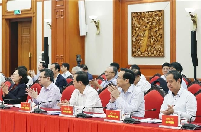 Thành viên Tiểu ban Kinh tế - Xã hội Đại hội XIV của Đảng tham dự buổi làm việc. Ảnh: Thống Nhất/TTXVN