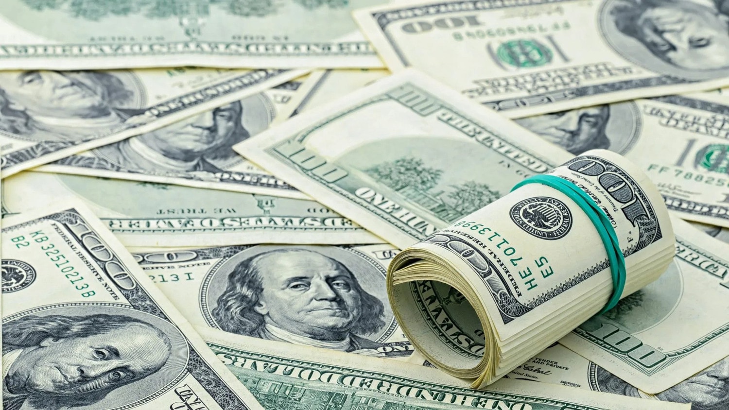 rolled-us-dollars-2048x1152jpg.jpg