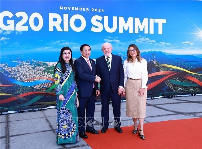 Tổng thống Brazil, Chủ tịch G20 Luiz Inácio Lula da Silva và Phu nhân đón Thủ tướng Phạm Minh Chính và Phu nhân. Ảnh: Dương Giang/TTXVN