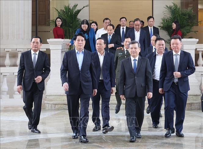 Chủ tịch nước Lương Cường với lãnh đạo Tòa án Nhân dân tối cao. Ảnh: Lâm Khánh/TTXVN