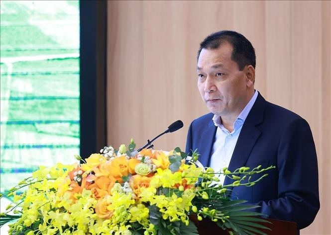 Chủ tịch HĐQT Tập đoàn Điện lực Việt Nam Đặng Hoàng An báo cáo tổng kết công tác đầu tư xây dựng dự án đường dây 500kV mạch 3 từ Quảng Trạch (Quảng Bình) đến Phố Nối (Hưng Yên). Ảnh: Dương Giang - TTXVN