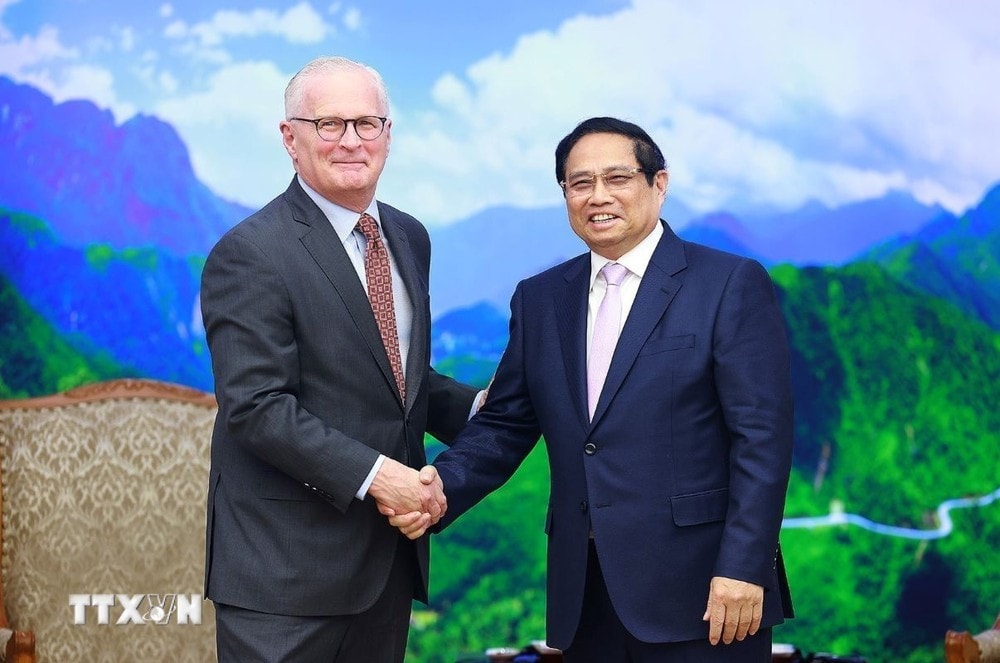 Thủ tướng Phạm Minh Chính tiếp ông John Neuffer, Chủ tịch Hiệp hội Công nghiệp Bán dẫn Hoa Kỳ (SIA). Ảnh: Dương Giang/TTXVN