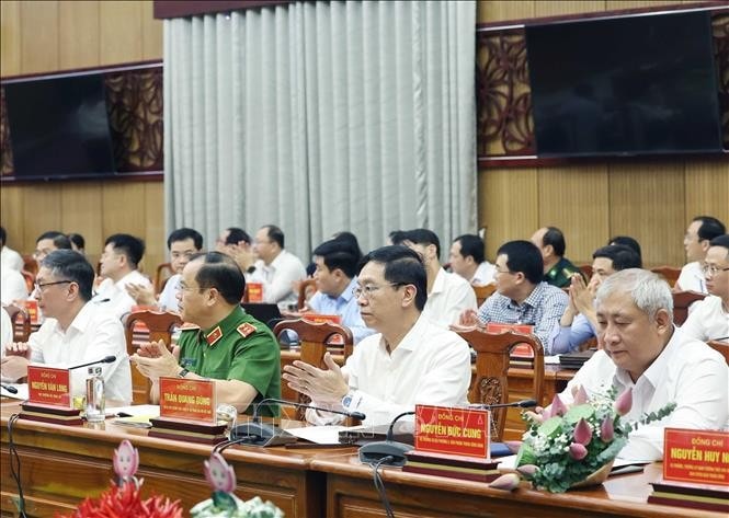 Các đại biểu tham dự cuộc làm việc. Ảnh: Thống Nhất- TTXVN