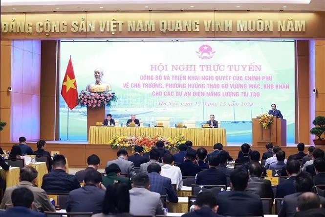 PM Pham Minh Chinh chairs the hybrid conference on December 12. (Photo: VNA) PM Pham Minh Chinh chairs the hybrid conference on December 12. (Photo: VNA)