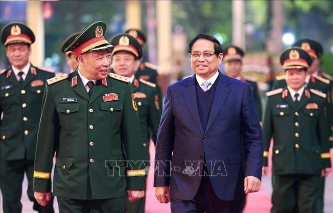 Thủ tướng Phạm Minh Chính đến thăm, chúc mừng cán bộ, giảng viên, học viên Học viện Quốc phòng. Ảnh: Dương Giang/TTXVN