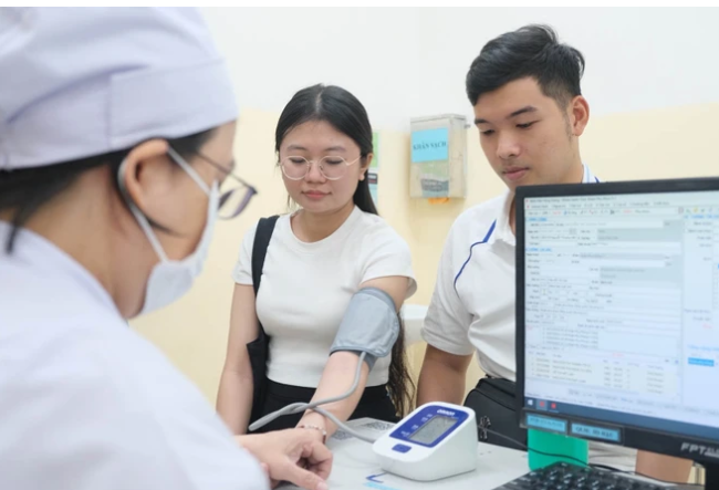 Một cặp đôi khám sức khỏe tiền hôn nhân tại Bệnh viện Hùng Vương TP. Hồ Chí Minh. Ảnh: Thành Sơn