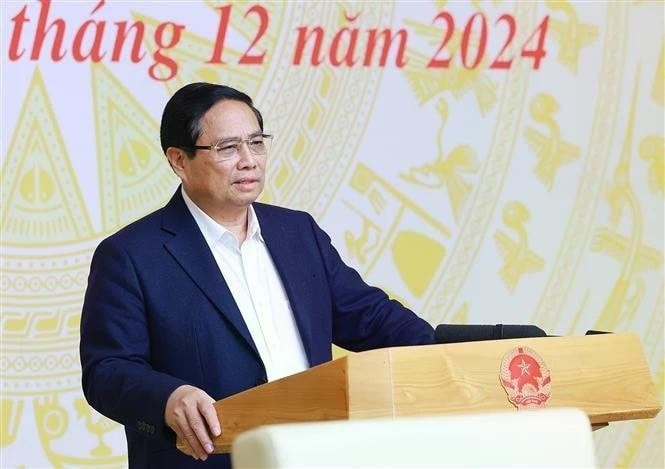 Prime Minister Pham Minh Chinh speaks at the national conference in Hanoi on December 25 on the implementation of the laws and resolutions passed by the 15th National Assembly (NA) at its eighth session. (Photo: VNA) img-5118.jpg