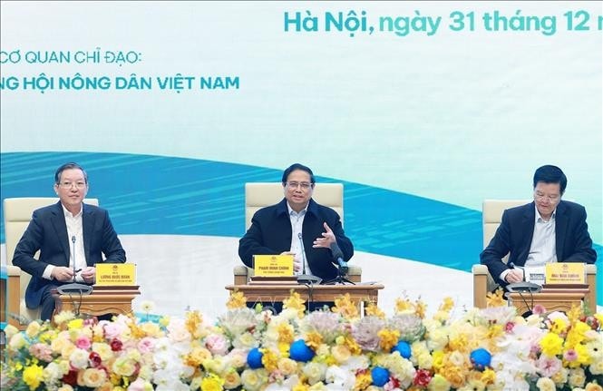 Thủ tướng Phạm Minh Chính đối thoại với nông dân. Ảnh: Dương Giang/TTXVN