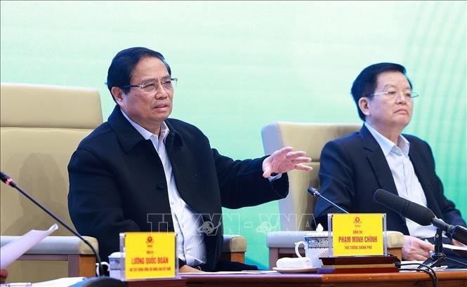Thủ tướng Phạm Minh Chính đối thoại với nông dân. Ảnh: Dương Giang/TTXVN